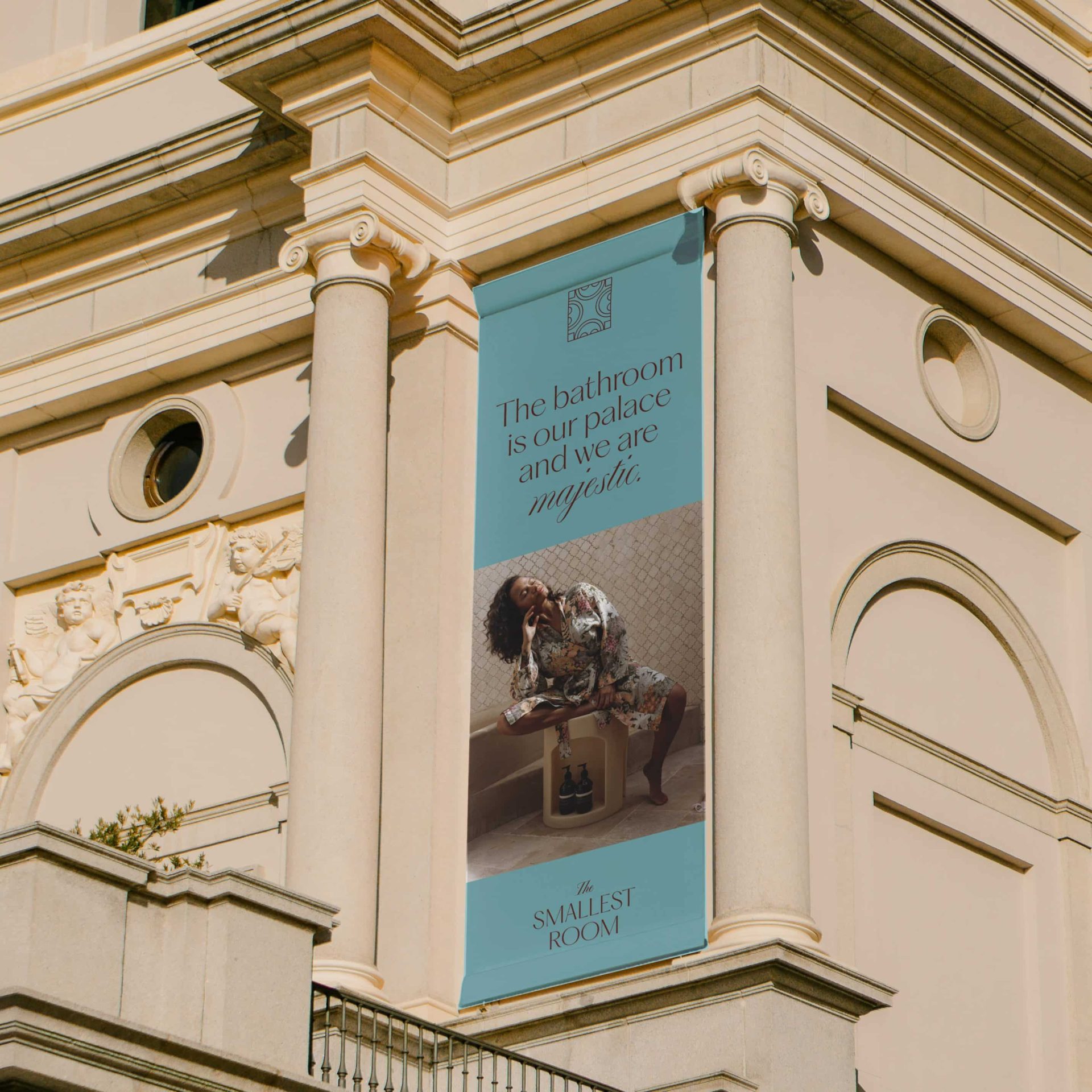 Graphic design for outdoor advertisement on a classic architecture
