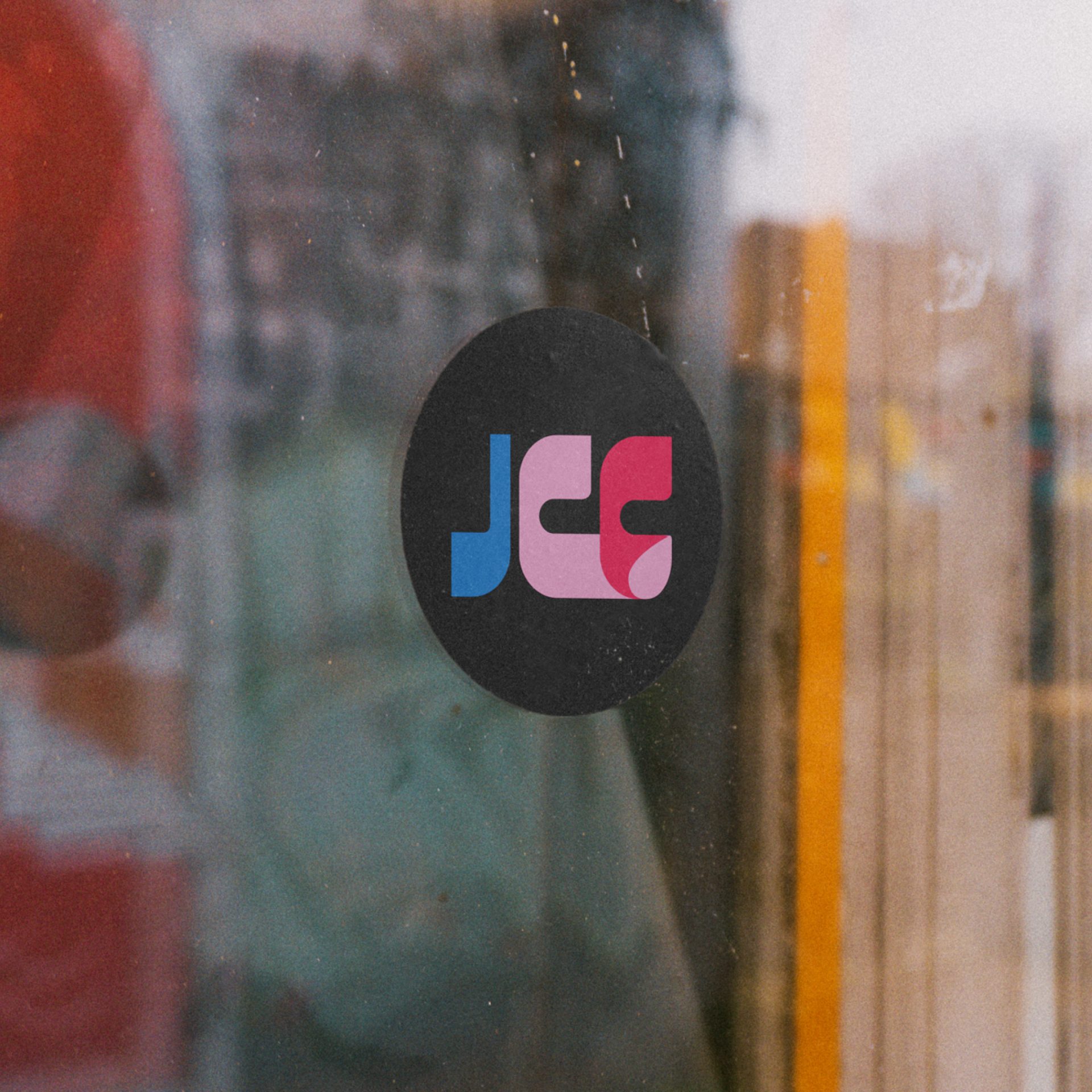Sticker design showing logo design for Jabiru Community College, featuring a bright, bold, clean aesthetic and queer-friendly rainbow tones.